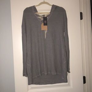 light grey sweater